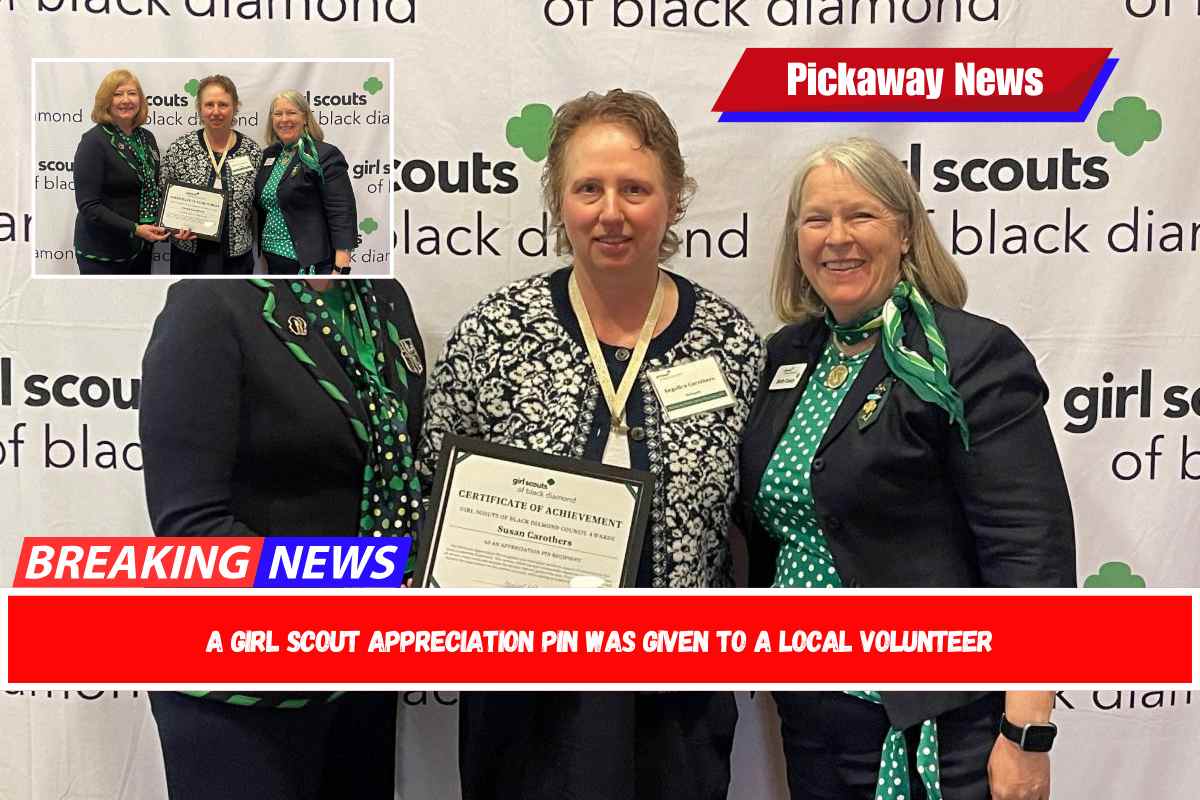 A Girl Scout Appreciation Pin was given to a local volunteer